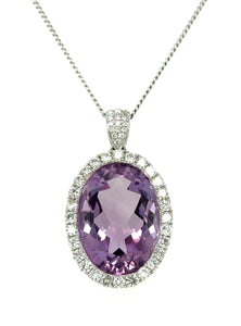 18ct White Gold Oval Amethyst And Diamond Cluster Pendant