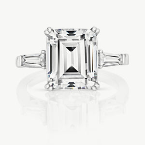 Emerald Cut Cubic Zirconia With Claw Setting And Tapered Baguette Shoulders