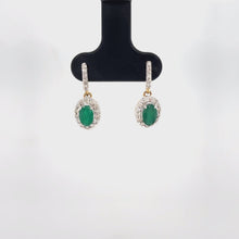 Load and play video in Gallery viewer, 9ct Gold Oval Emerald And Diamond Drop Earrings
