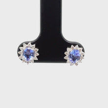 Load and play video in Gallery viewer, 18ct White Gold Oval Shaped Tanzanite And Diamond Stud Earrings
