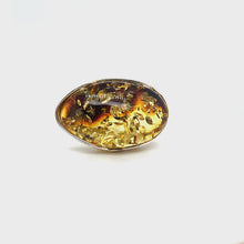 Load and play video in Gallery viewer, Statement Sterling Silver And Elongated Oval Green Amber Ring
