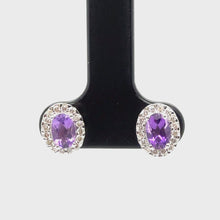 Load and play video in Gallery viewer, 9ct White Gold Oval Shaped Amethyst And Diamond Stud Earrings
