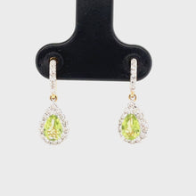 Load and play video in Gallery viewer, 9ct Yellow Gold Pear Shaped Peridot And Diamond Drop Earrings
