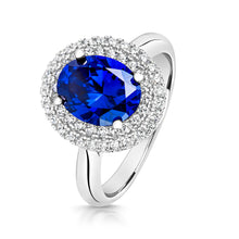 Load image into Gallery viewer, Double Halo Dress Ring With Blue Centre Oval Cubic Zirconia

