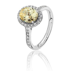 Silver Large Claw Set Oval Shape Halo Style Yellow CZ Ring