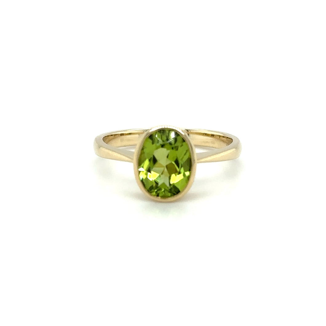 9ct Yellow Gold Oval Faceted Peridot Rub Over Setting Ring
