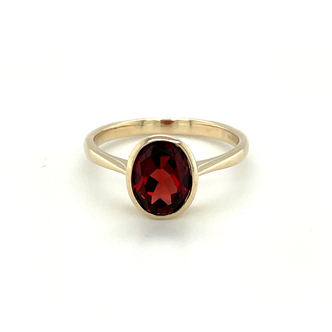 9ct Yellow Gold Oval Faceted Garnet Rub Over Setting Ring